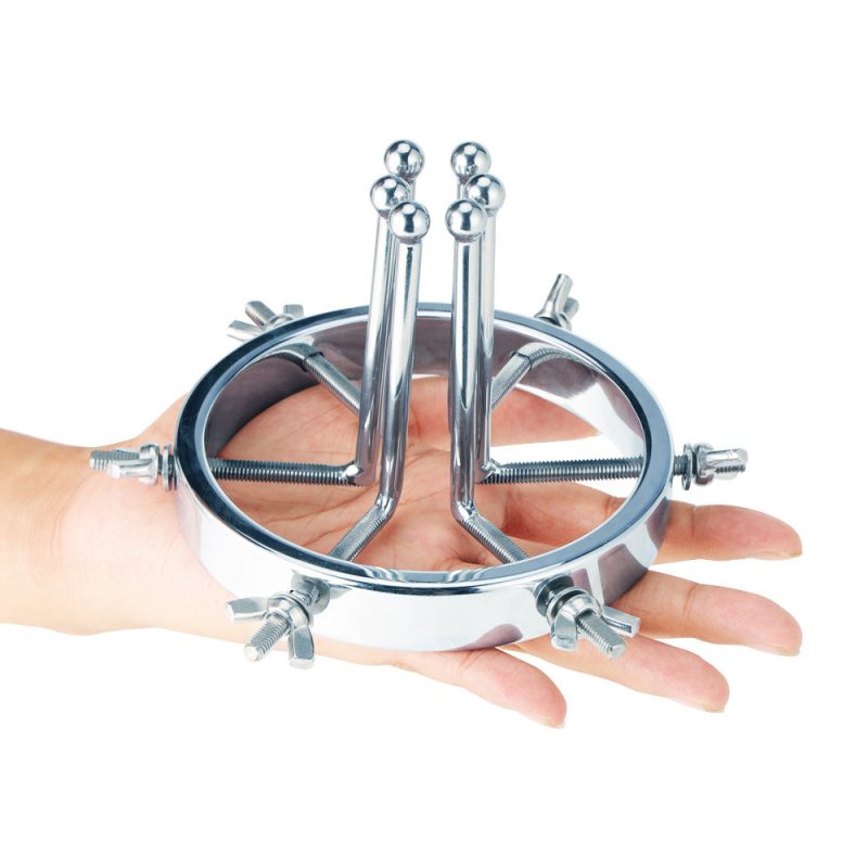 Metal anal plug BDSM toy with chains and clamps for adult pleasure and domination play, shiny silver finish.