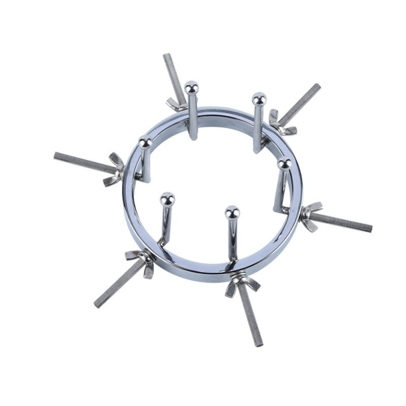 Clitoral stimulator ring with metal pins for adult pleasure.