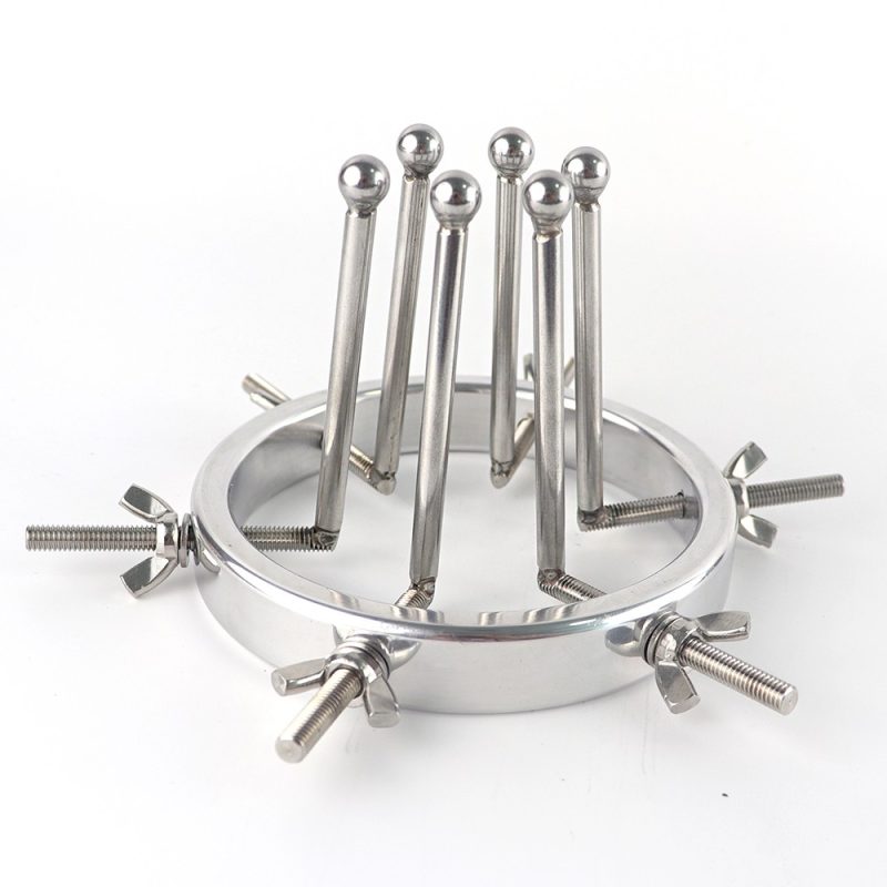Polished metal spike and ring BDSM restraint device for adult pleasure.