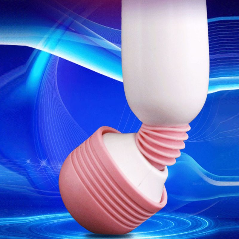 Silicone sex toy with a pink base and white upper part, ergonomic design, vibrant background.