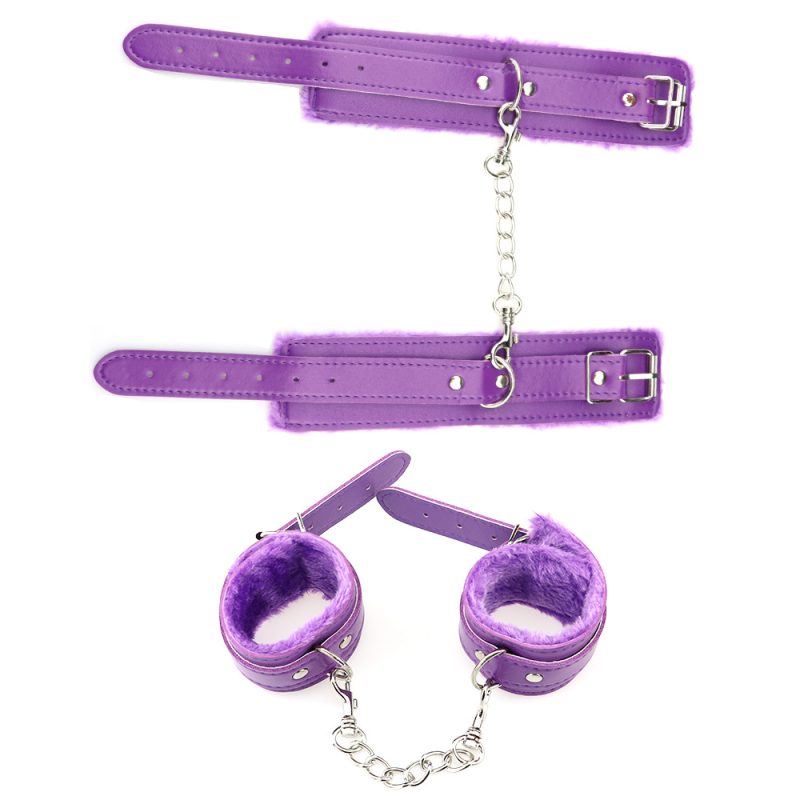 Purple BDSM impact cuffs and wrist restraints with metal chains for adult role play and bondage fun.