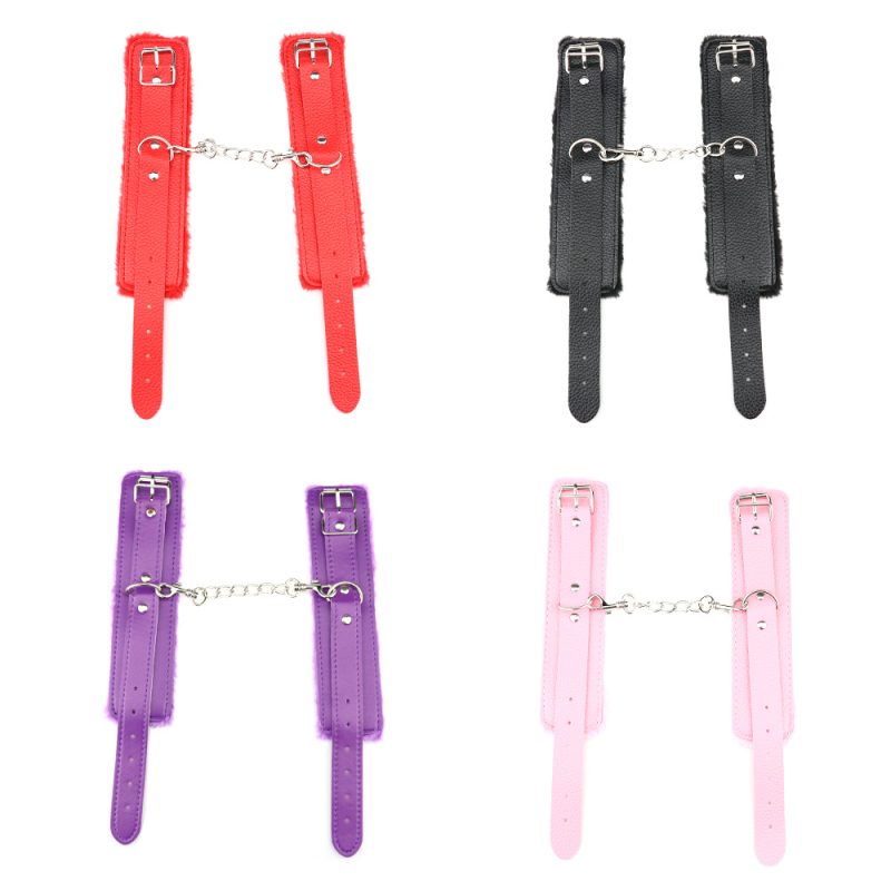 Strap-on harness with adjustable straps and chain, available in red, black, purple, and pink.