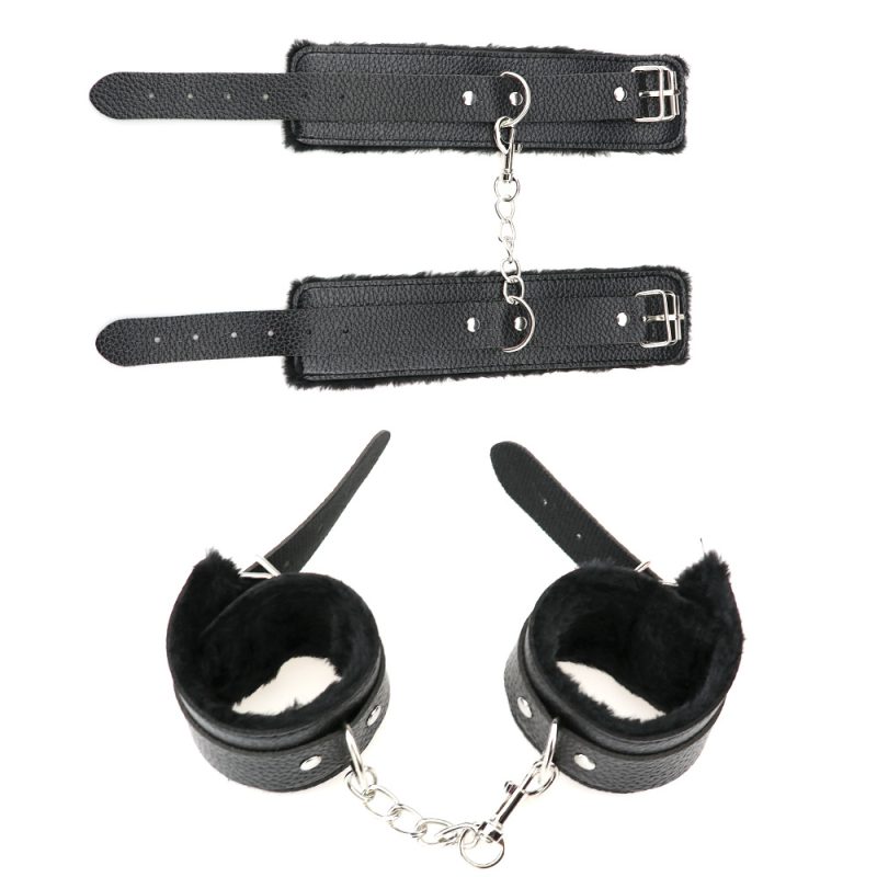 Leather bondage cuffs with ankle restraints and chain, BDSM fetish sex toy accessories.