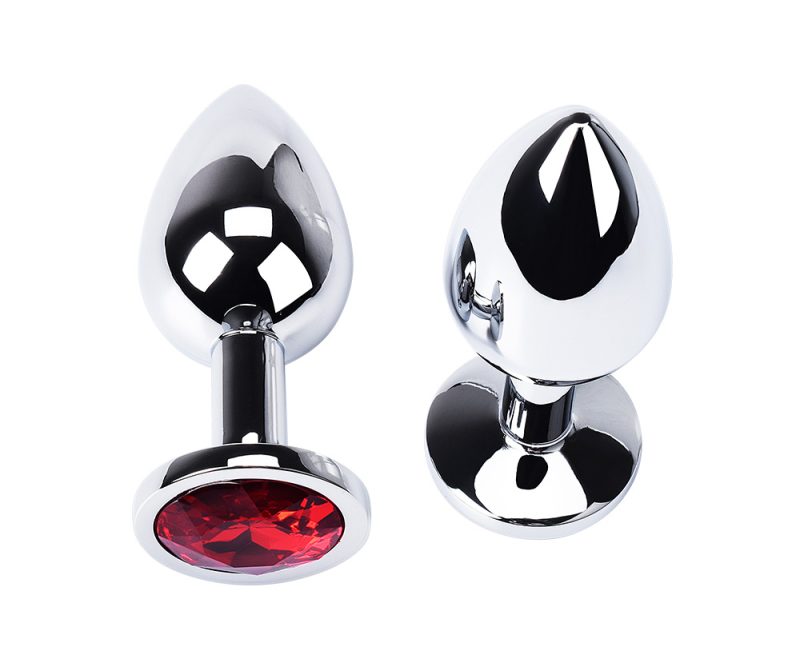 Shiny chrome anal plug with red gem accent, luxurious adult sex toy for women and men.