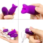 Vibrant purple fish-shaped adult vibrator for intimate pleasure and stimulation. Compact, portable,.