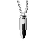 Stylish metallic vibrator pendant on chain, discreet adult jewelry accessory.