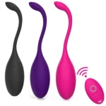 Vibrant black, purple, and pink silicone vibrators with remote control for versatile pleasure.