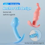 Blue and pink anchor tail anal plugs with soft, tight fit design for beginners.