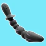 Graduated vibrating anal beads with prostate tip in black with purple accents.