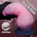 Pink silicone knotted dildo with suction cup for easy use and cleaning.
