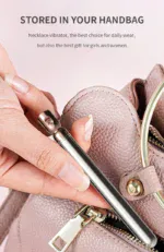 Stainless steel necklace vibrator stored in a handbag for discreet use.