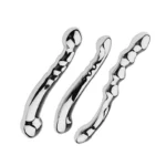 Weighted stainless steel dual-end wand with textured surface for adult pleasure.